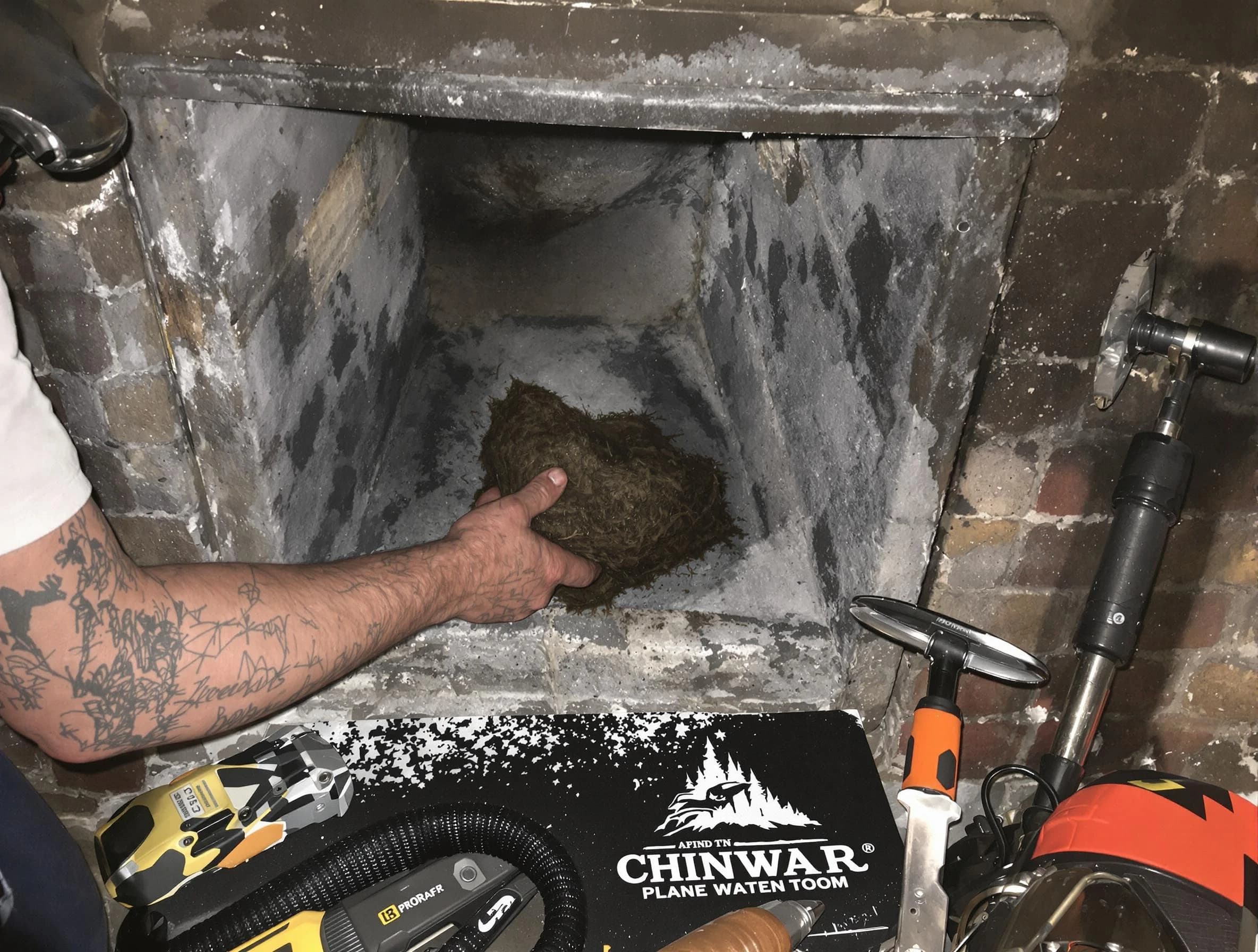 College Park Chimney Sweep safely removing debris and screening chimney in College Park, GA